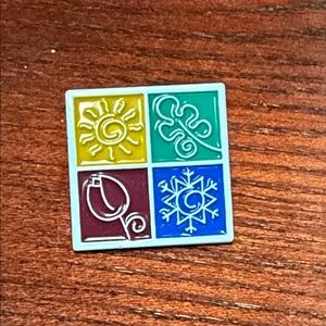 Colorful Enamel Pin with Seasonal Symbols